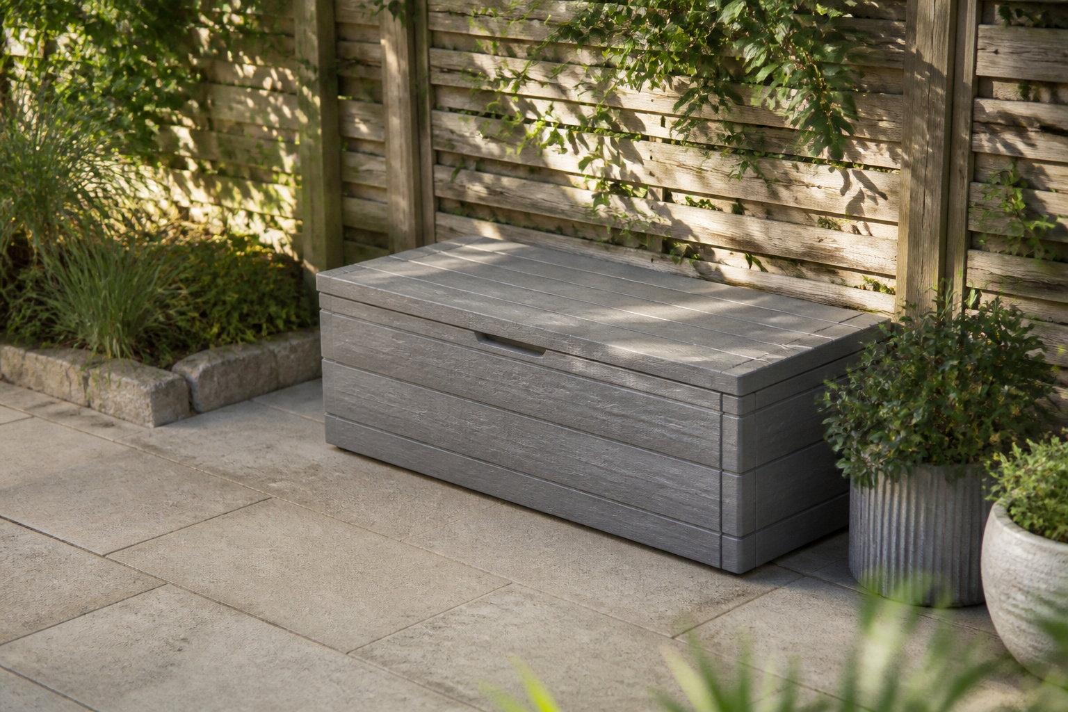 Various outdoor furniture storage options arranged on a patio.